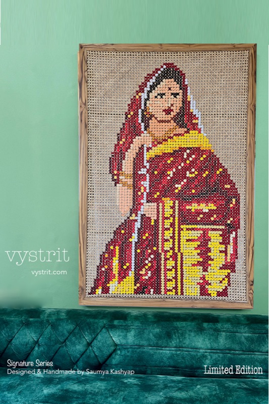 Lady in Red Saree: a woman wrapped in a red saree, standing three quarters to the viewer, hung on a green wall.